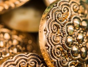 Intricate gold jewellery design with detailed craftsmanship